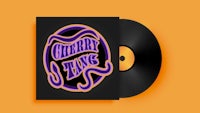 a purple and orange vinyl record with the words'cherry zins'